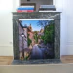 Pose d’un visuel décoratif sur un foyer de cheminée